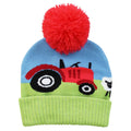 Tractor Hat flat lay on white background showing knitted tractor and farmyard scene with red pompom